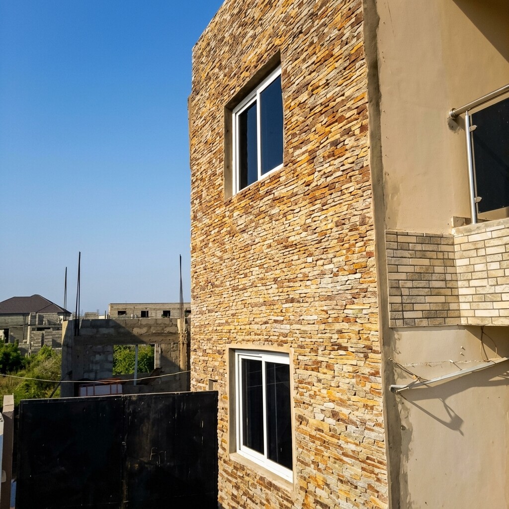 Premium Golden-Russet Cladding project by Tim's Natural Marble Stones, Accra